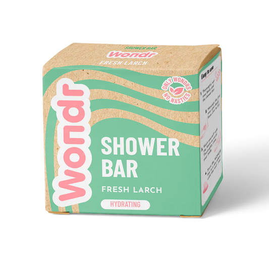 A packaged shower bar product labeled 'WONDR SHOWER BAR FRESH LARCH' with a beige and green color scheme.