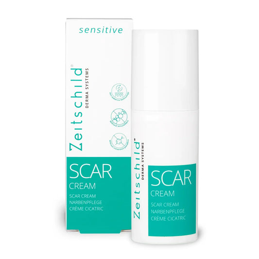 Packaging of ZEITSCHILD Scar cream, featuring a white and teal box with a tube of cream inside.