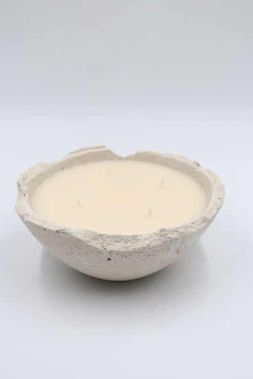 Luxury scented soy wax candle made in concrete bowl in Dubai