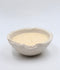 Non toxic and sustainable scented soy wax bowl candle in handmade concrete Eries vessel