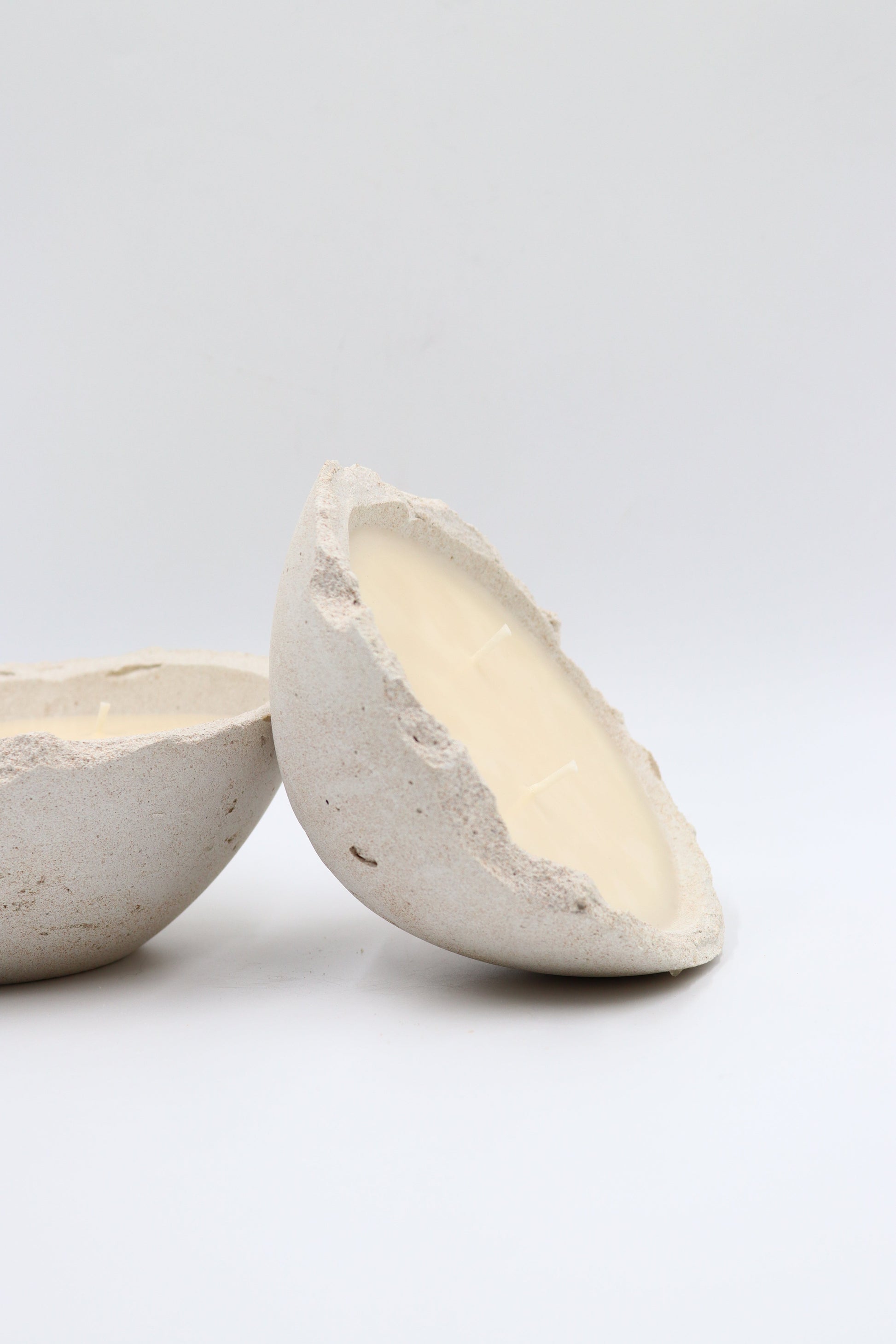 Minimalistic design scented soy wax bowl candle in handmade concrete Eries vessel